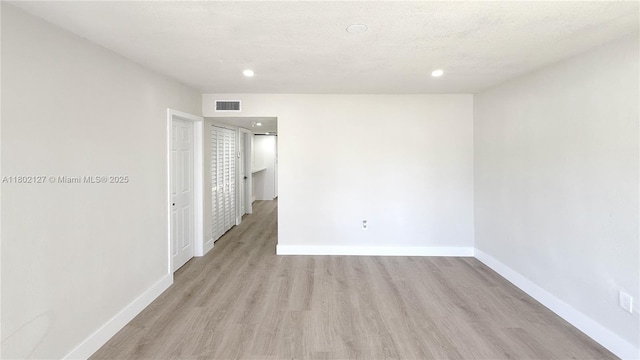 5531 SW 38th St, West Park, FL 33023 - unfurnished room featuring light wood-style flooring, baseboards, and recessed lighting