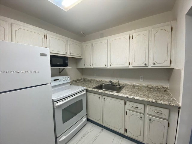 111 Tilford F Unit 111, Deerfield Beach, FL 33442 - kitchen featuring white appliances, a sink, light marble finish floors, and light countertops