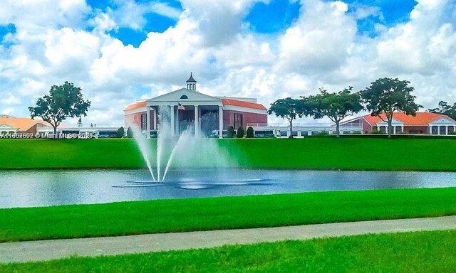 111 Tilford F Unit 111, Deerfield Beach, FL 33442 - view of property's community featuring a water view and a yard