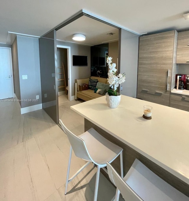 650 NE 32nd St Unit 3704, Miami, FL 33137 - dining space with light marble finish flooring
