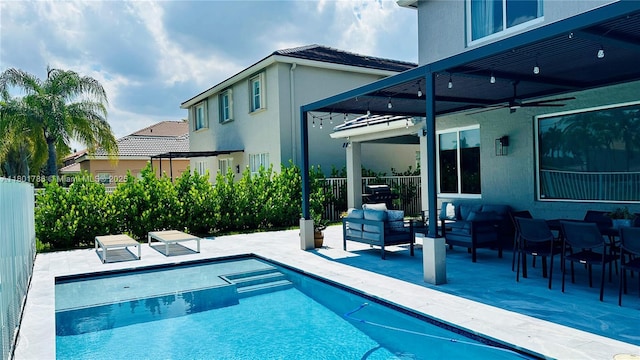 1192 Chinaberry Dr, Weston, FL 33327 - view of pool featuring a patio area, a ceiling fan, an outdoor living space, and fence