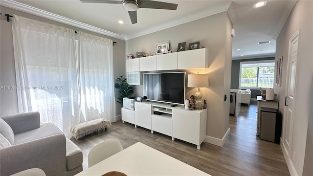 1192 Chinaberry Dr, Weston, FL 33327 - living room with wood finished floors, crown molding, a ceiling fan, baseboards, and recessed lighting