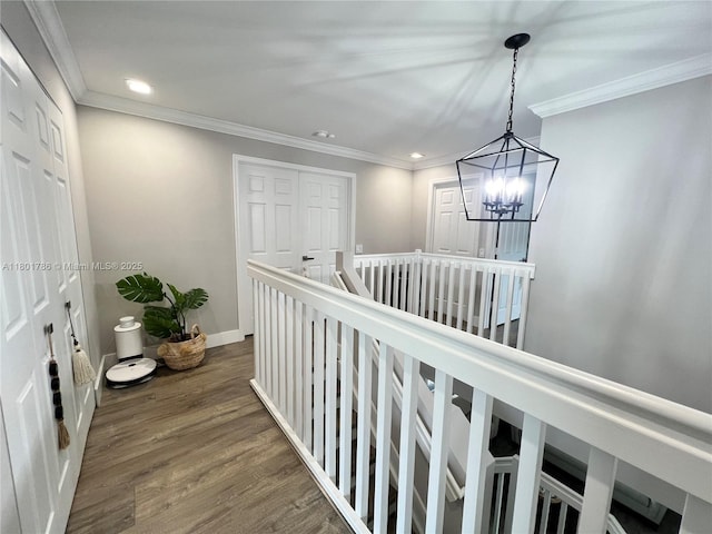 1192 Chinaberry Dr, Weston, FL 33327 - hall featuring an upstairs landing, dark wood-type flooring, ornamental molding, recessed lighting, and a chandelier
