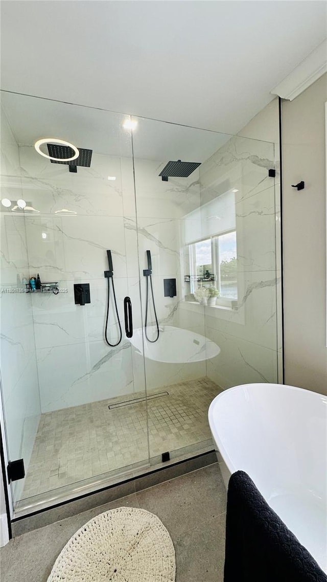 1192 Chinaberry Dr, Weston, FL 33327 - bathroom with a marble finish shower, speckled floor, and a freestanding tub
