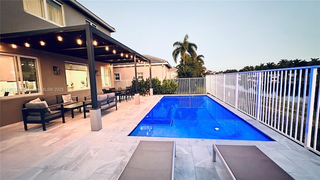 1192 Chinaberry Dr, Weston, FL 33327 - view of swimming pool featuring a patio, fence, and an outdoor living space