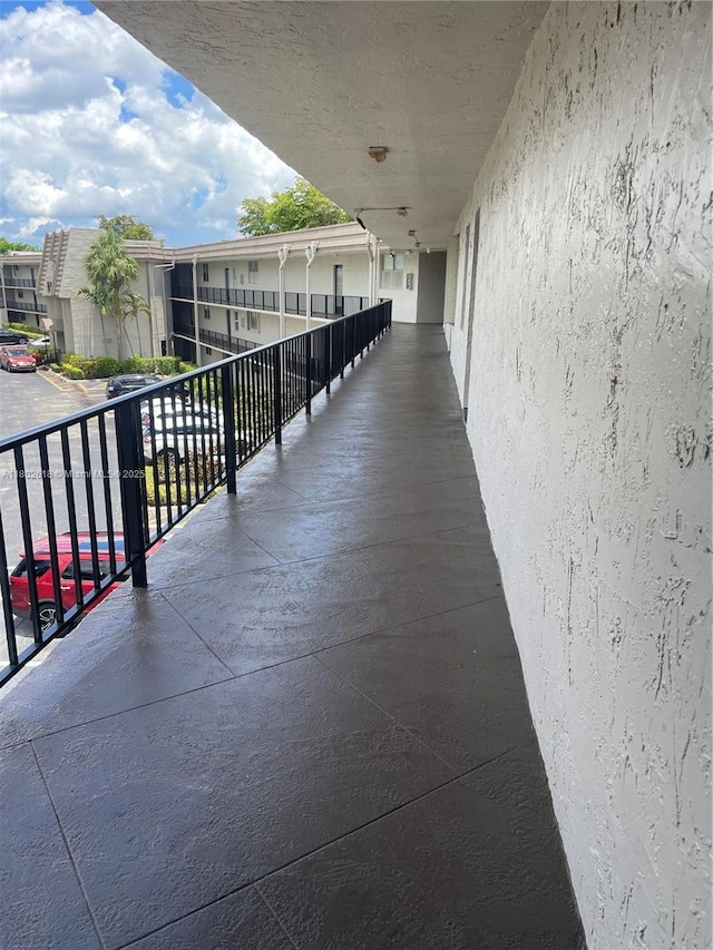 9330 Lime Bay Blvd Unit 315, Tamarac, FL 33321 - view of patio featuring a balcony
