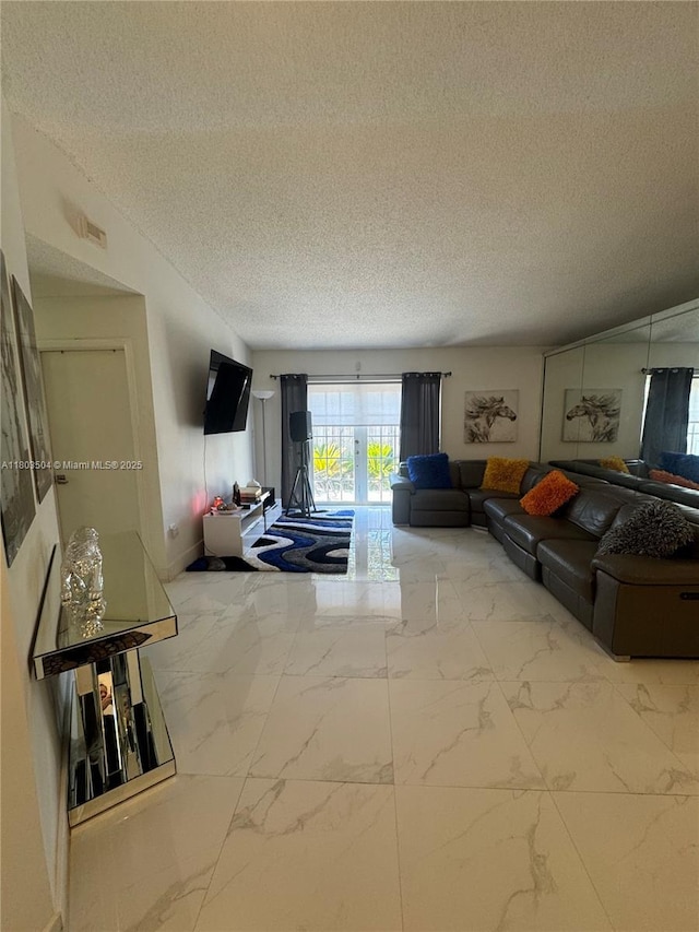 19321 NW 83rd Ave, Hialeah, FL 33015 - living room featuring marble finish flooring and a textured ceiling