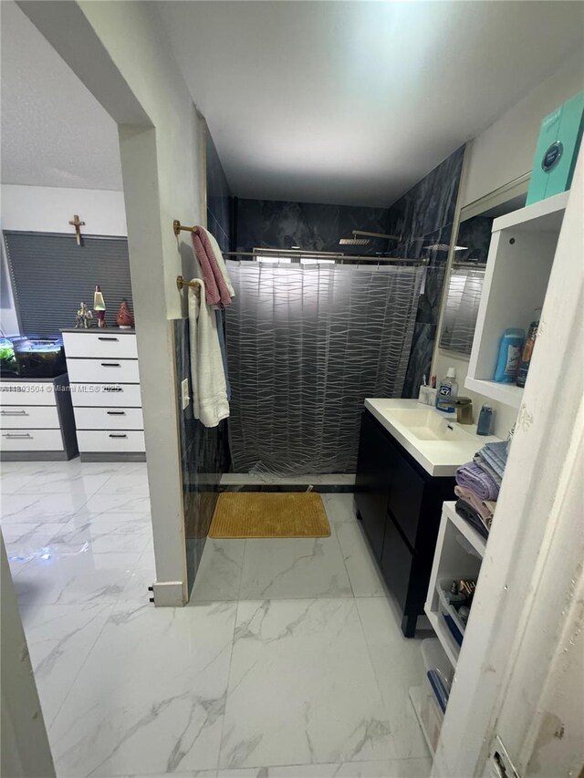 19321 NW 83rd Ave, Hialeah, FL 33015 - full bathroom with marble look tiles, a walk in shower, and vanity