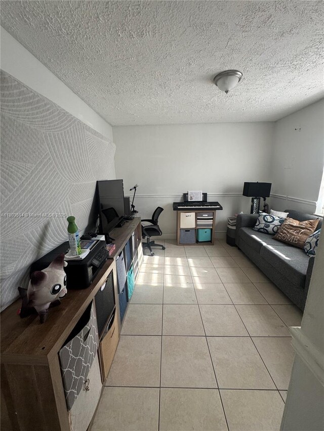 19321 NW 83rd Ave, Hialeah, FL 33015 - living room featuring light tile patterned floors and a textured ceiling