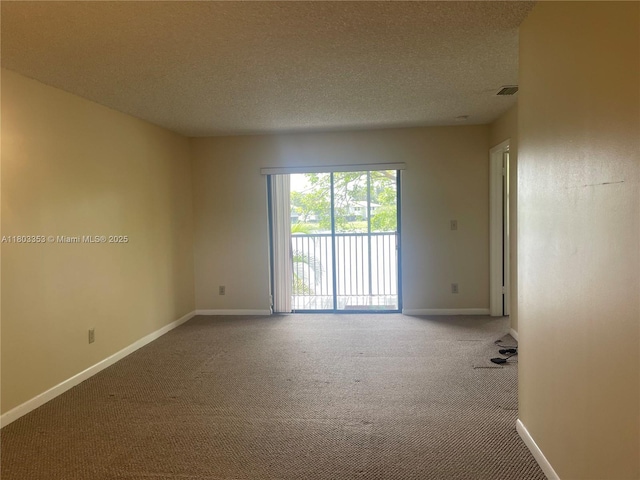 1124 NW 106th Ter Unit 202, Pembroke Pines, FL 33026 - carpeted spare room featuring baseboards and a textured ceiling