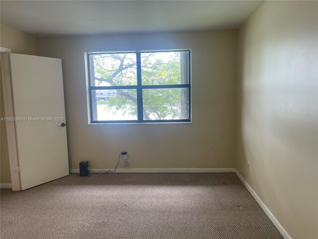 1124 NW 106th Ter Unit 202, Pembroke Pines, FL 33026 - unfurnished room with carpet and baseboards