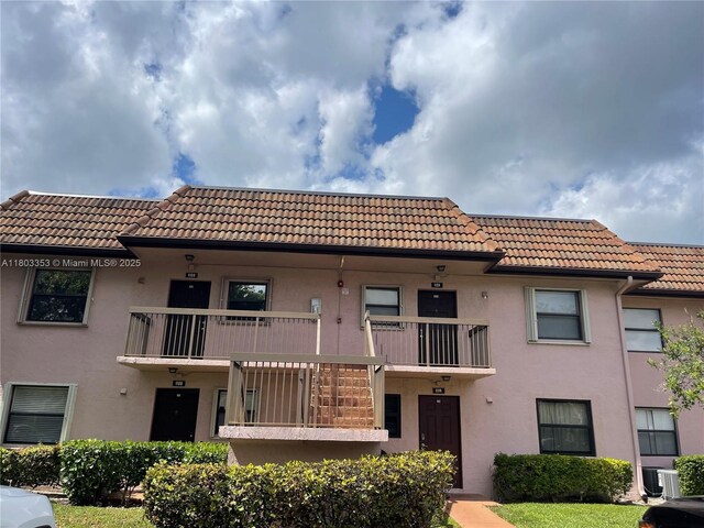 1124 NW 106th Ter Unit 202, Pembroke Pines, FL 33026 - view of building exterior with cooling unit