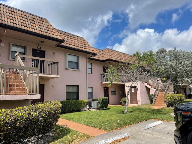 1124 NW 106th Ter Unit 202, Pembroke Pines, FL 33026 - view of property featuring stairs and cooling unit