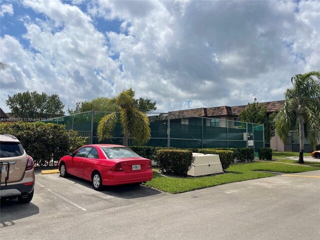 1124 NW 106th Ter Unit 202, Pembroke Pines, FL 33026 - view of uncovered parking lot