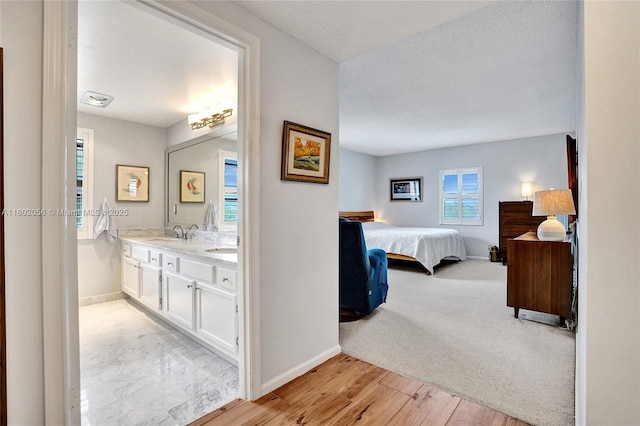 2679 S Ocean Blvd Unit 2B, Boca Raton, FL 33432 - dining area featuring a textured ceiling, light wood-style floors, and crown molding