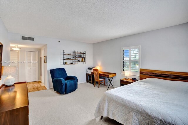 2679 S Ocean Blvd Unit 2B, Boca Raton, FL 33432 - bedroom with carpet floors, a textured ceiling, and baseboards