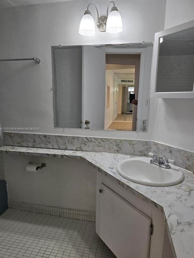 1201 NE 191st St Unit G211, Miami, FL 33179 - bathroom with vanity and tile patterned flooring