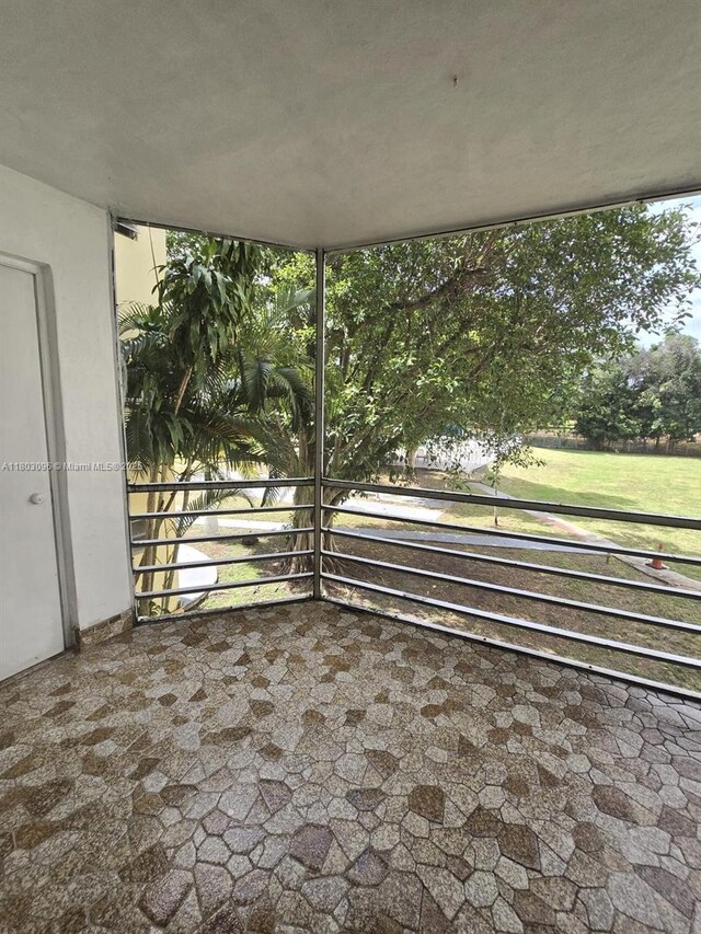 1201 NE 191st St Unit G211, Miami, FL 33179 - view of patio with a balcony