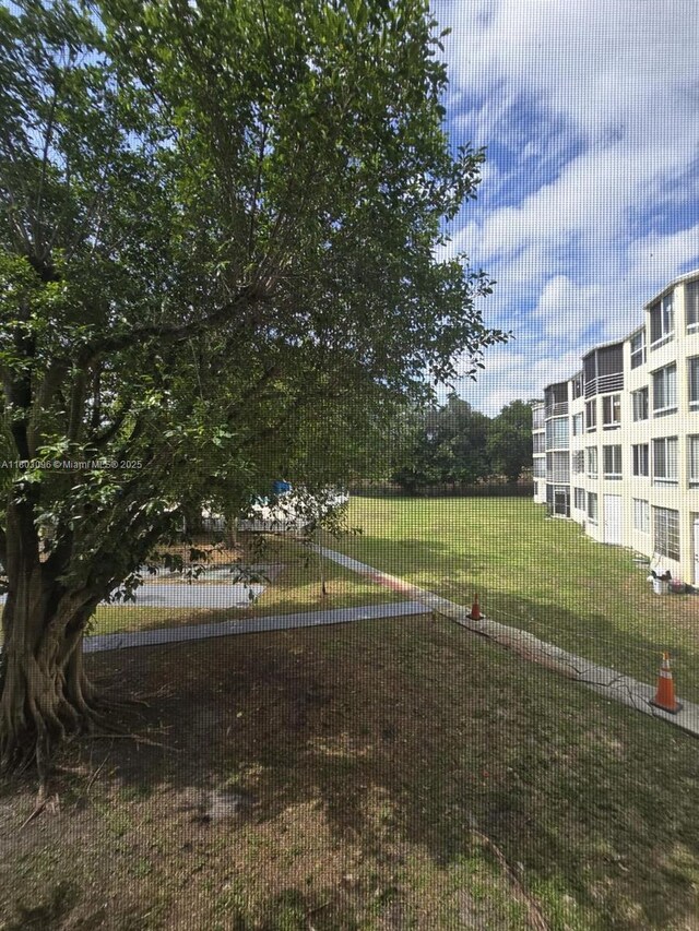 1201 NE 191st St Unit G211, Miami, FL 33179 - view of grassy yard