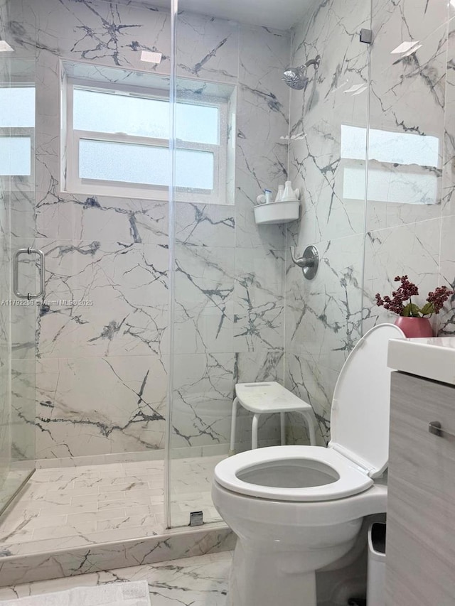 11360 NW 31st St, Sunrise, FL 33323 - full bathroom with toilet, plenty of natural light, a marble finish shower, marble finish flooring, and tile walls