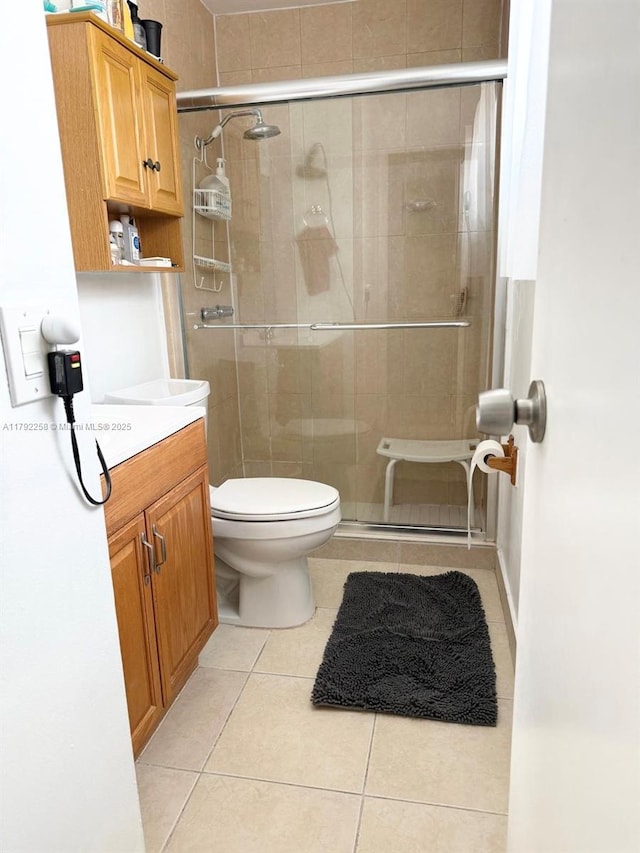 11360 NW 31st St, Sunrise, FL 33323 - bathroom featuring tile patterned flooring, a shower stall, toilet, and vanity