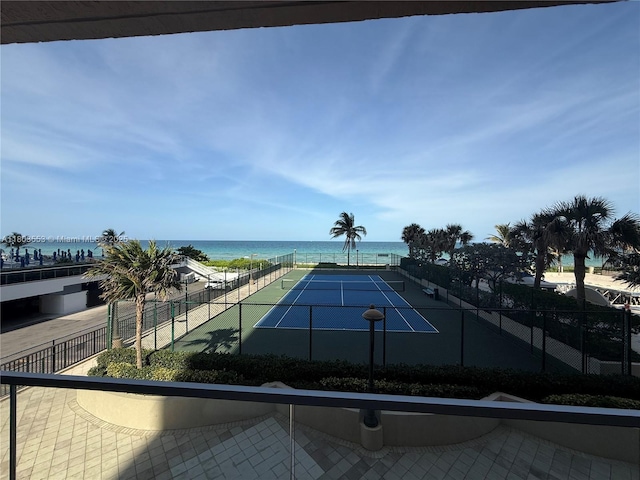 1912 S Ocean Dr Unit 3D, Hallandale Beach, FL 33009 - view of tennis court with a water view