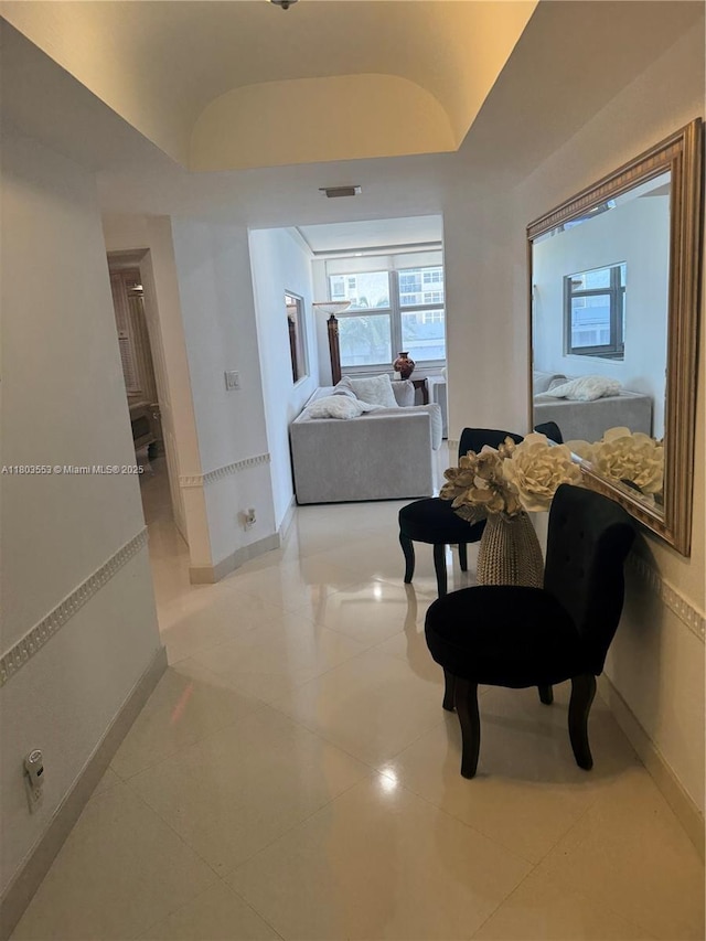 1912 S Ocean Dr Unit 3D, Hallandale Beach, FL 33009 - corridor featuring baseboards and lofted ceiling