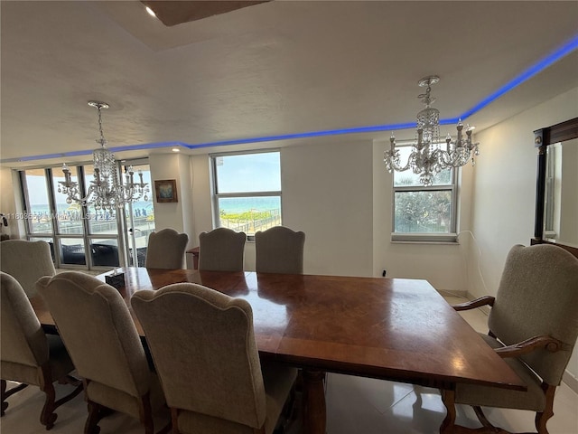 1912 S Ocean Dr Unit 3D, Hallandale Beach, FL 33009 - dining room with a chandelier and healthy amount of natural light