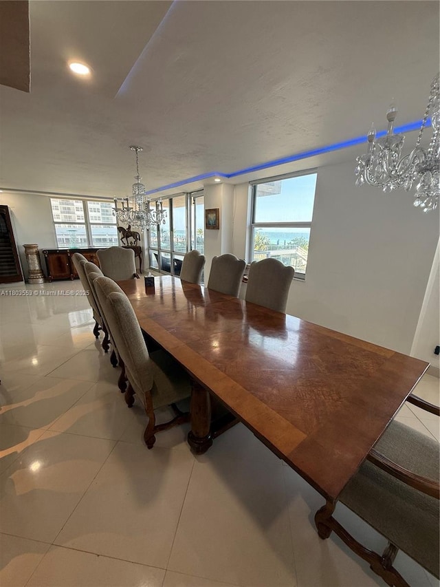 1912 S Ocean Dr Unit 3D, Hallandale Beach, FL 33009 - tiled dining room featuring a chandelier