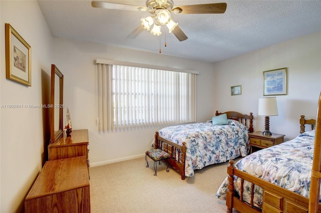 424 SE 10th St Unit 405, Dania Beach, FL 33004 - carpeted bedroom with a textured ceiling, a ceiling fan, and baseboards
