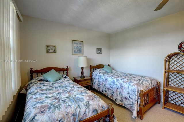 424 SE 10th St Unit 405, Dania Beach, FL 33004 - bedroom with carpet flooring, ceiling fan, and a textured ceiling