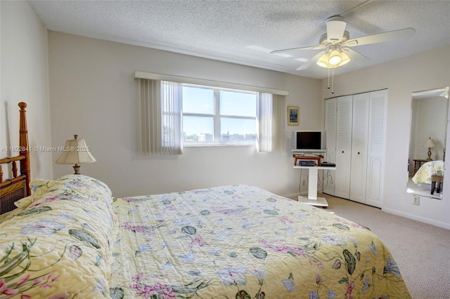 424 SE 10th St Unit 405, Dania Beach, FL 33004 - carpeted bedroom with a closet, a ceiling fan, and a textured ceiling