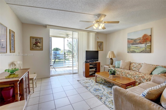 424 SE 10th St Unit 405, Dania Beach, FL 33004 - living room with ceiling fan, light tile patterned floors, and a textured ceiling
