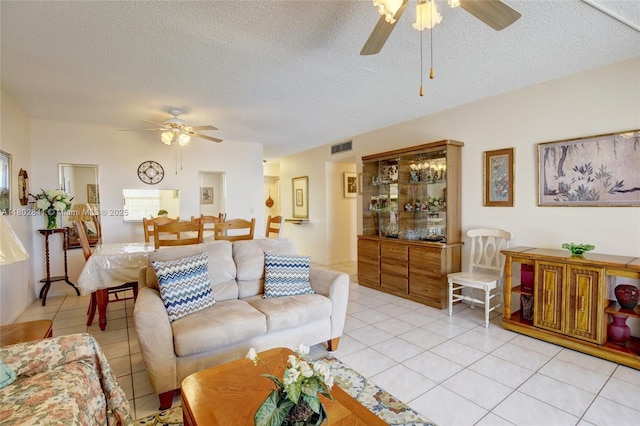 424 SE 10th St Unit 405, Dania Beach, FL 33004 - living area featuring ceiling fan, light tile patterned floors, and a textured ceiling