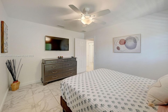 932 Polk St, Hollywood, FL 33019 - bedroom featuring light marble finish floors and a ceiling fan