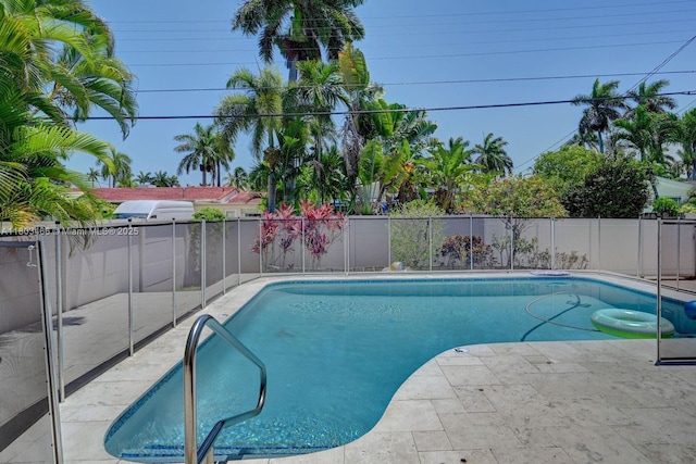932 Polk St, Hollywood, FL 33019 - view of swimming pool featuring a fenced backyard and a patio area