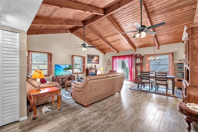 living room featuring ceiling fan, wooden ceiling, wood finished floors, and baseboards
