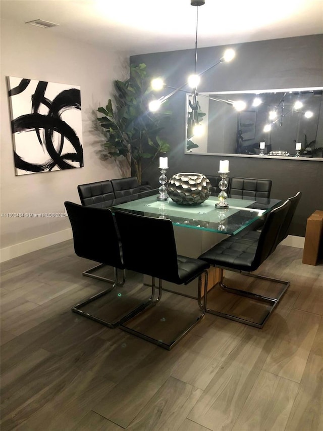 3195 W 10th Ave, Hialeah, FL 33012 - dining space with wood finished floors and baseboards