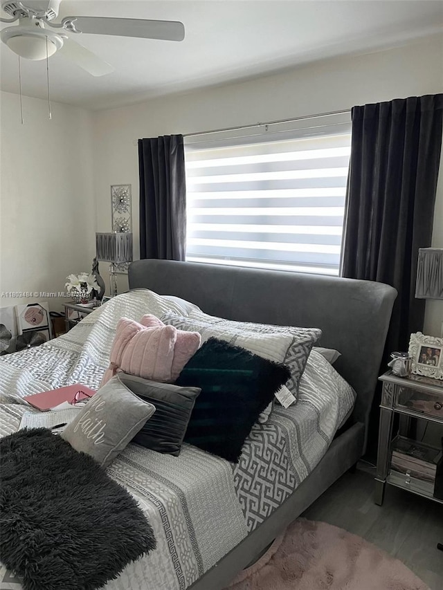 3195 W 10th Ave, Hialeah, FL 33012 - bedroom featuring wood finished floors and ceiling fan