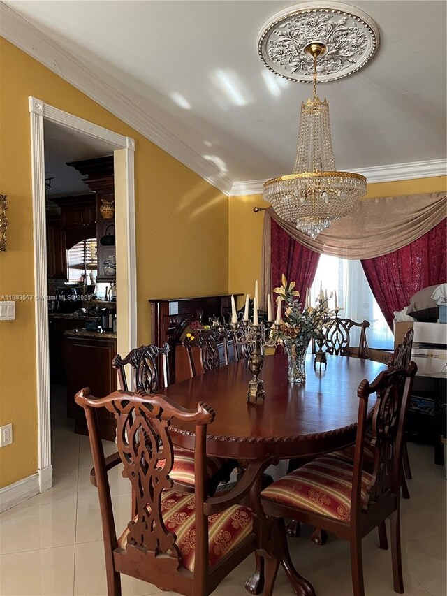 1900 SW 141st Ave, Miami, FL 33175 - dining space featuring a chandelier, ornamental molding, and light tile patterned floors