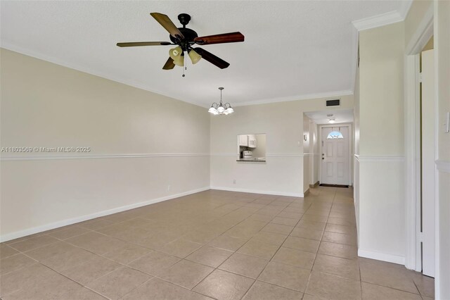 551 NW 80th Ter Unit 203, Margate, FL 33063 - spare room with light tile patterned floors, ornamental molding, a ceiling fan, a chandelier, and baseboards