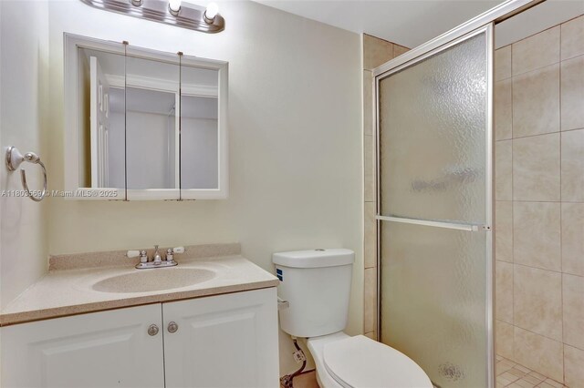 551 NW 80th Ter Unit 203, Margate, FL 33063 - full bath with a shower stall, toilet, and vanity