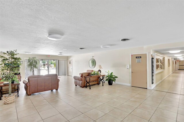 551 NW 80th Ter Unit 203, Margate, FL 33063 - common area with a textured ceiling