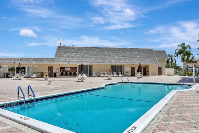 551 NW 80th Ter Unit 203, Margate, FL 33063 - community pool featuring a patio