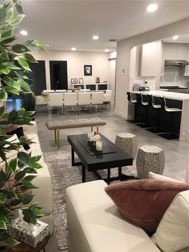 9224 Byron Ave, Surfside, FL 33154 - living room featuring recessed lighting