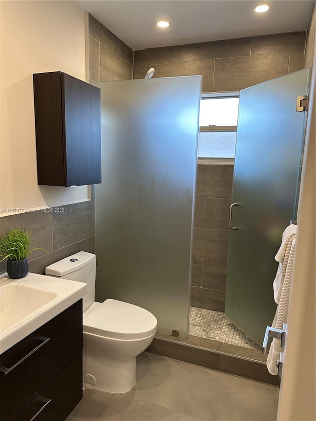 9224 Byron Ave, Surfside, FL 33154 - full bath featuring tile walls, a shower stall, toilet, vanity, and recessed lighting