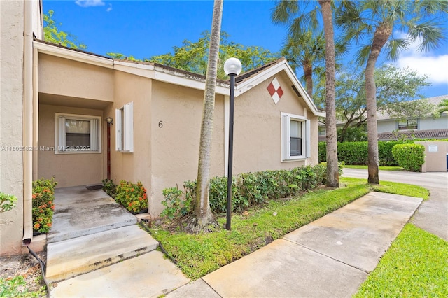 9641 Riverside Dr Unit F6, Coral Springs, FL 33071 - view of home's exterior featuring stucco siding