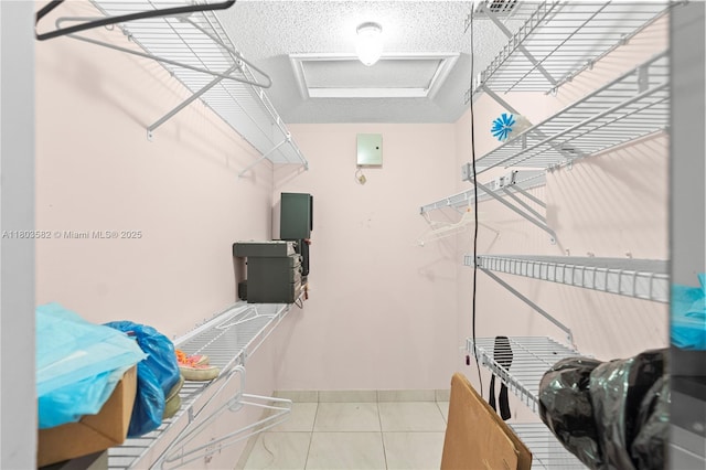 9641 Riverside Dr Unit F6, Coral Springs, FL 33071 - walk in closet with attic access and tile patterned floors
