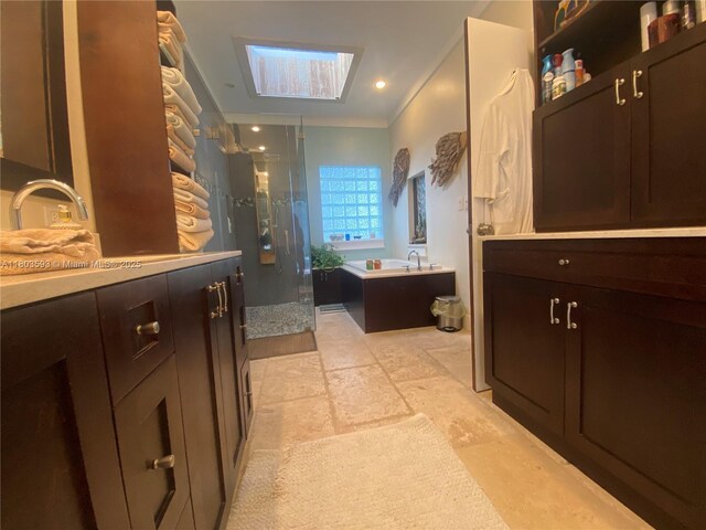 2180 SW 115th Ter, Davie, FL 33325 - bathroom with a skylight, a stall shower, a bath, crown molding, and vanity