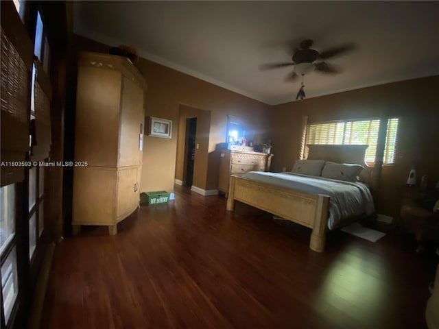 2180 SW 115th Ter, Davie, FL 33325 - bedroom featuring dark wood-style flooring, crown molding, baseboards, and a ceiling fan